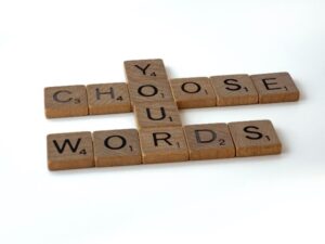 Choose Your Words Written in Scrabble Tiles