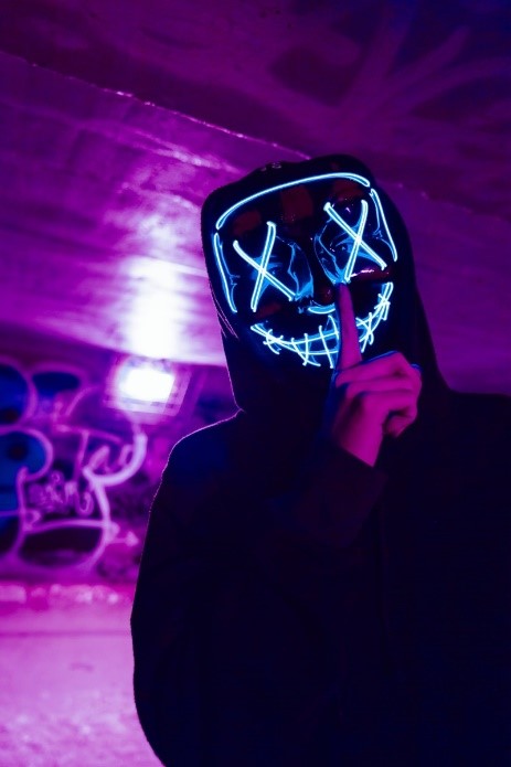 Graffiti Artist With Neon Mask