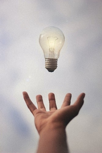 Hand Under Lightbulb